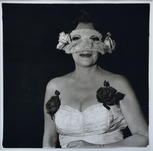 DIANE ARBUS - Lady at a masked ball with two roses on her dress, N.Y.C., 1967